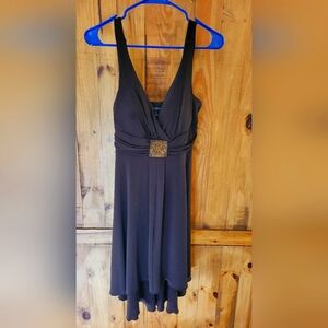 Dark brown dress size adult 12 worn only once for wedding.
